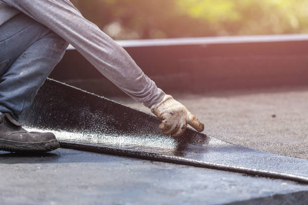 Professional Waterproofing technician working in Basom, NY